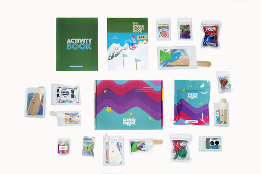 Top-down view of all the items in the Wanderbox monthly kids subscription box